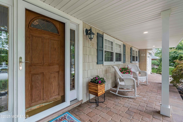 entrance to property with a porch