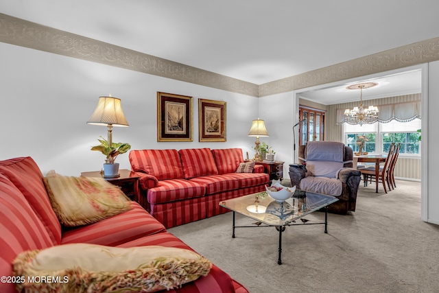 carpeted living area with an inviting chandelier