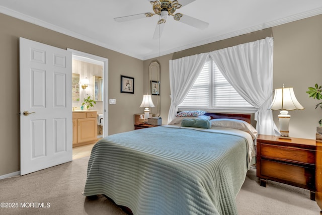 bedroom featuring light colored carpet, crown molding, ensuite bath, and ceiling fan