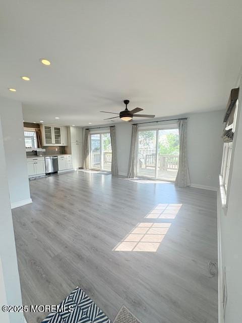 14 Jonathan Dr, Manahawkin, NJ 08050 - unfurnished living room with recessed lighting, a ceiling fan, and wood finished floors