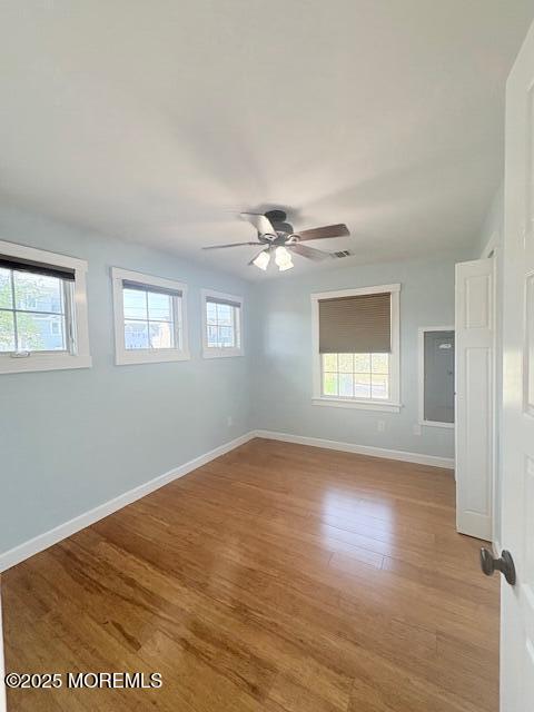 14 Jonathan Dr, Manahawkin, NJ 08050 - empty room with light wood-style floors and ceiling fan