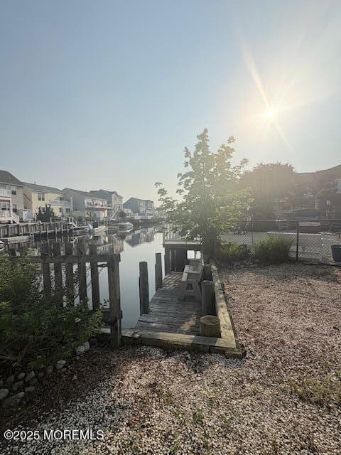 14 Jonathan Dr, Manahawkin, NJ 08050 - view of yard featuring a dock