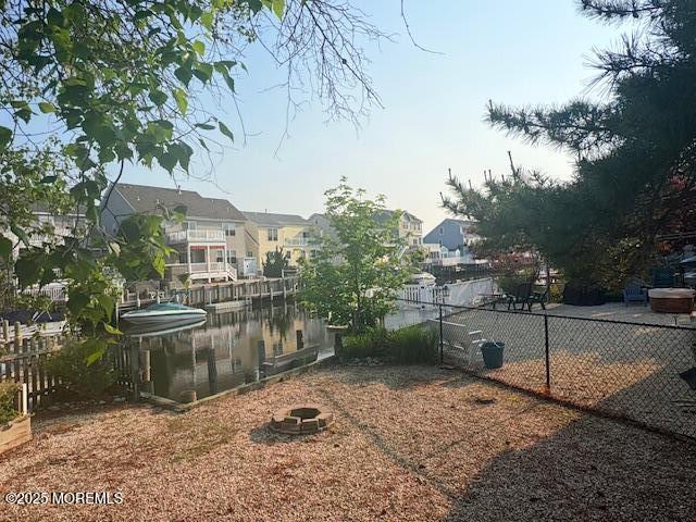 14 Jonathan Dr, Manahawkin, NJ 08050 - view of yard with a residential view and a water view