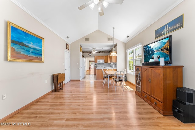 87 Halsted Dr, Manchester, NJ 08759 - dining area with light wood-type flooring, ceiling fan, lofted ceiling, and visible vents