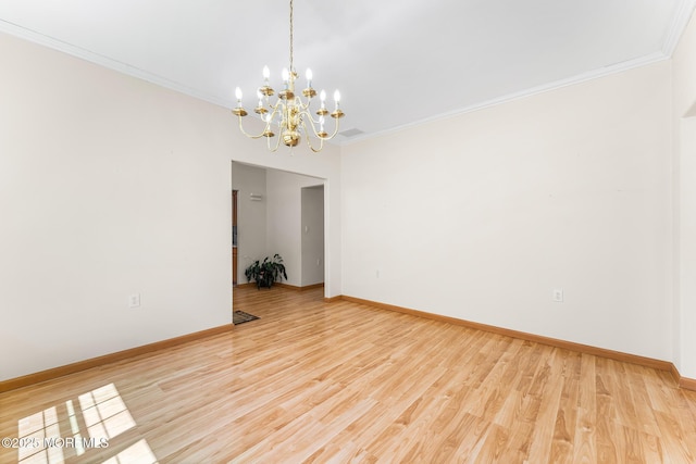 87 Halsted Dr, Manchester, NJ 08759 - unfurnished room featuring an inviting chandelier, ornamental molding, and light wood-style floors