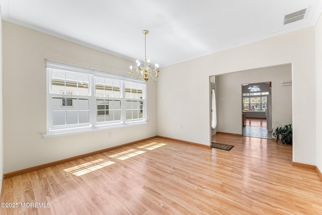 87 Halsted Dr, Manchester, NJ 08759 - unfurnished room with visible vents, ornamental molding, baseboards, light wood-type flooring, and a chandelier