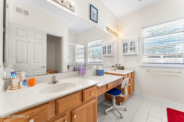87 Halsted Dr, Manchester, NJ 08759 - full bathroom with double vanity, visible vents, tile patterned flooring, a stall shower, and a sink