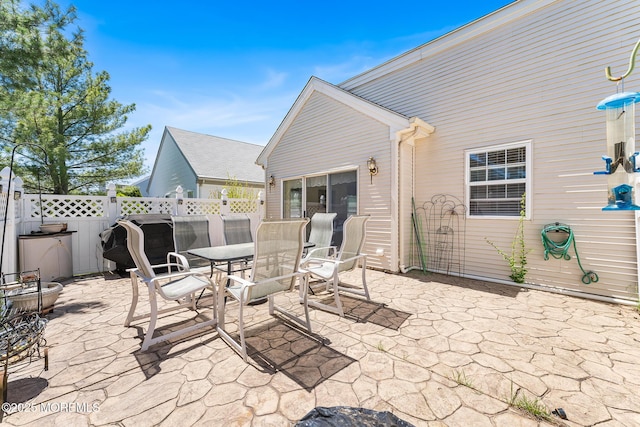 87 Halsted Dr, Manchester, NJ 08759 - view of patio featuring fence and outdoor dining area