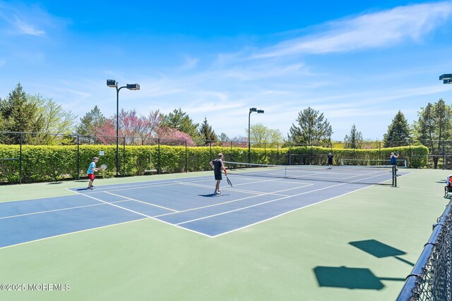 87 Halsted Dr, Manchester, NJ 08759 - view of tennis court featuring community basketball court and fence