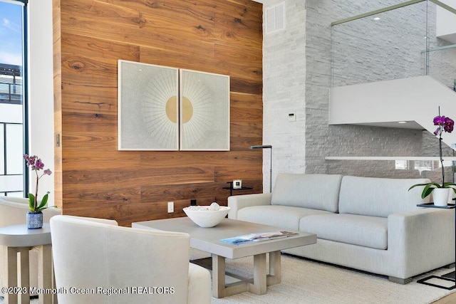 living room featuring visible vents