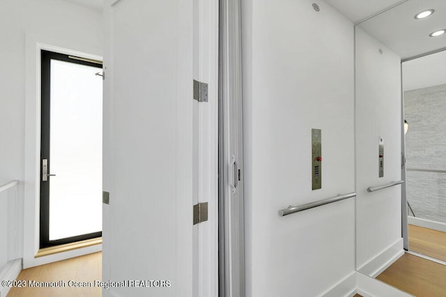 room details with wood finished floors and recessed lighting