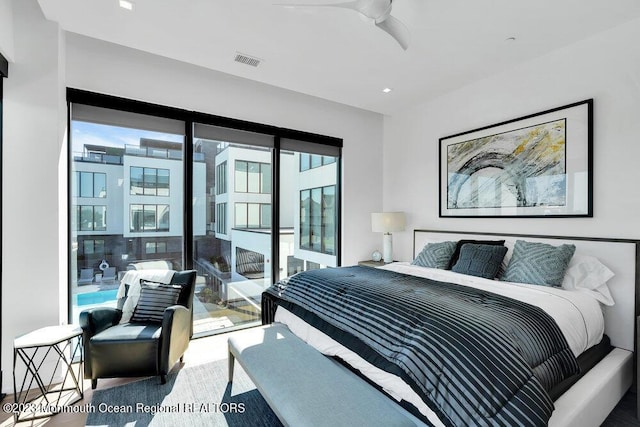 bedroom featuring access to exterior and visible vents
