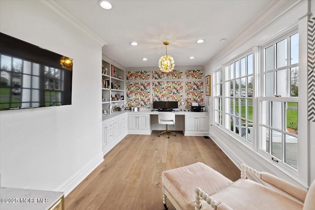 office space with crown molding, recessed lighting, and built in study area