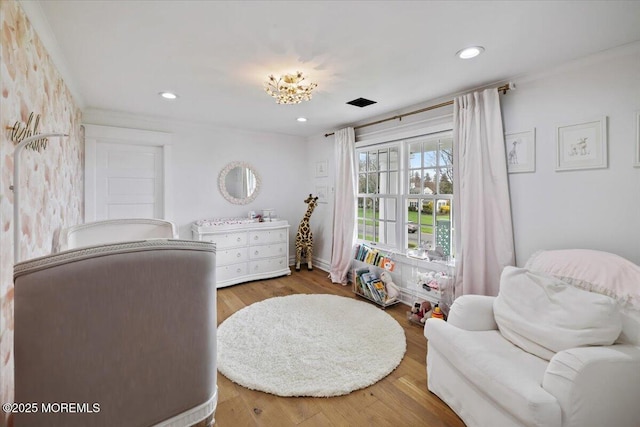 interior space featuring wood finished floors and recessed lighting