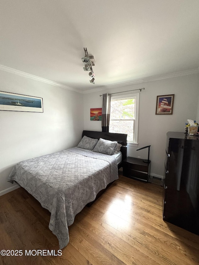 12 Yates Ave, South River, NJ 08882 - bedroom with ornamental molding and light wood-style floors