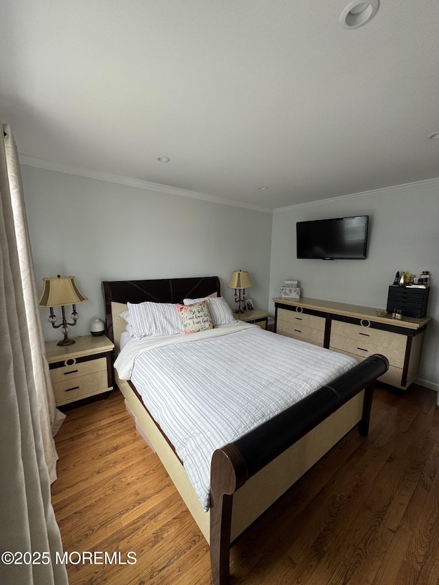12 Yates Ave, South River, NJ 08882 - bedroom featuring wood finished floors and ornamental molding