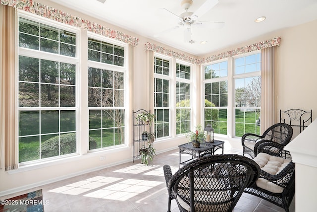 sunroom featuring recessed lighting, tile patterned flooring, and baseboards