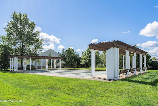 view of home's community featuring a pergola, a yard, and shuffleboard