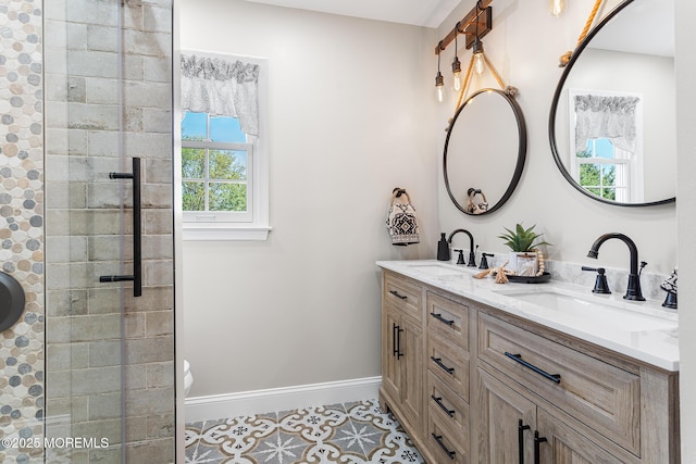 bathroom featuring a sink, tile patterned flooring, and plenty of natural light