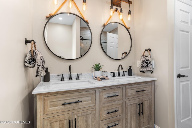 bathroom featuring double vanity and a sink
