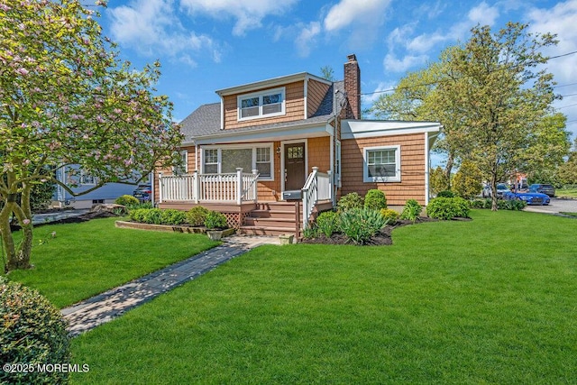 4 W Lake Rd, Red Bank, NJ 07701 - bungalow featuring a chimney, a front yard, and a porch