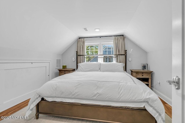 4 W Lake Rd, Red Bank, NJ 07701 - bedroom featuring wood finished floors, vaulted ceiling, and baseboards