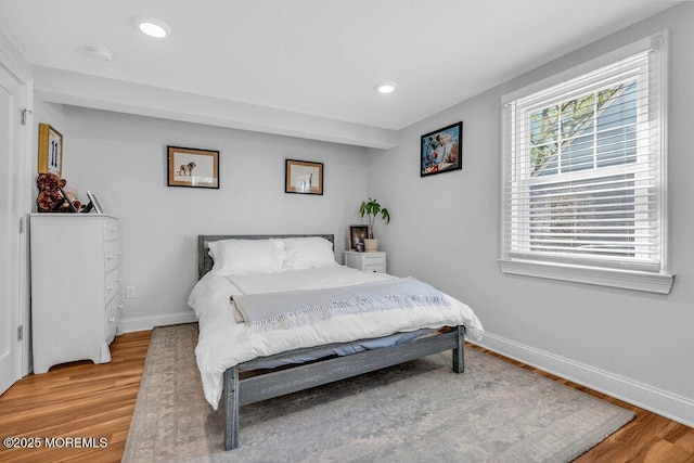 4 W Lake Rd, Red Bank, NJ 07701 - bedroom with light wood finished floors, baseboards, and recessed lighting
