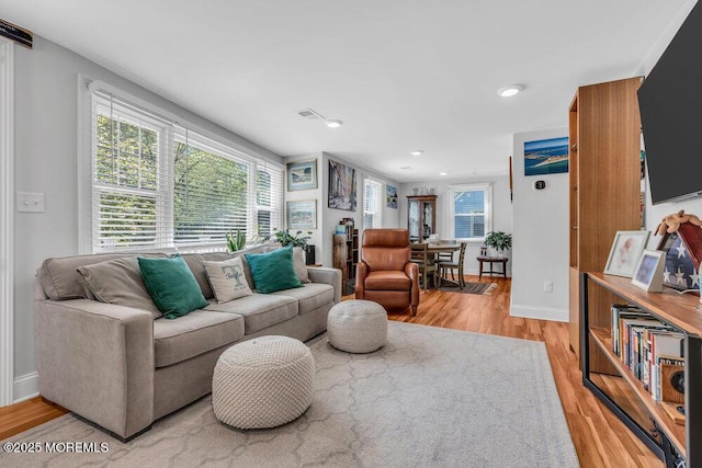 4 W Lake Rd, Red Bank, NJ 07701 - living area with light wood finished floors, baseboards, and recessed lighting