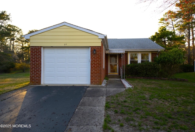 27 Moccasin Dr, Whiting, NJ 08759 - ranch-style house with brick siding, driveway, a front lawn, and roof with shingles