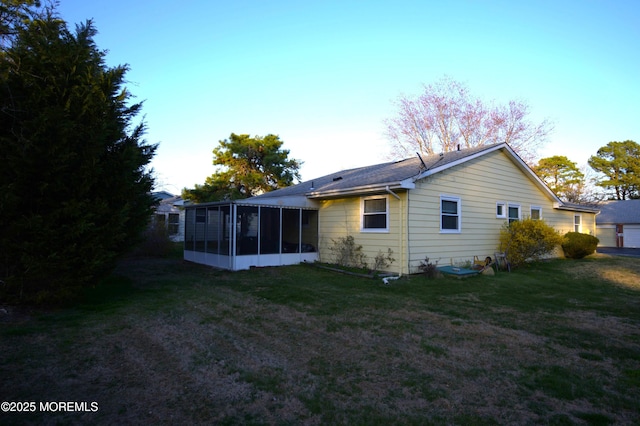 27 Moccasin Dr, Whiting, NJ 08759 - rear view of house featuring a sunroom and a yard