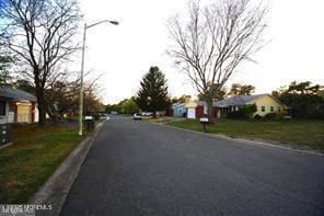 27 Moccasin Dr, Whiting, NJ 08759 - view of asphalt road with street lighting and a residential view
