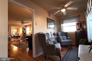 27 Moccasin Dr, Whiting, NJ 08759 - living area featuring ceiling fan and wood finished floors