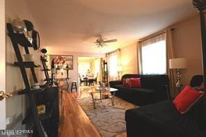 27 Moccasin Dr, Whiting, NJ 08759 - living area featuring ceiling fan and wood finished floors