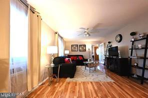 27 Moccasin Dr, Whiting, NJ 08759 - living room with a ceiling fan and wood finished floors