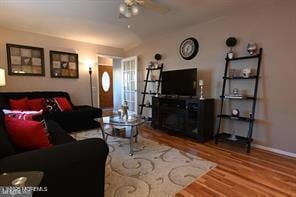 27 Moccasin Dr, Whiting, NJ 08759 - living area featuring wood finished floors, ceiling fan, and baseboards