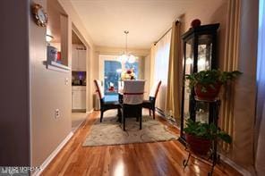 27 Moccasin Dr, Whiting, NJ 08759 - dining space featuring wood finished floors and baseboards