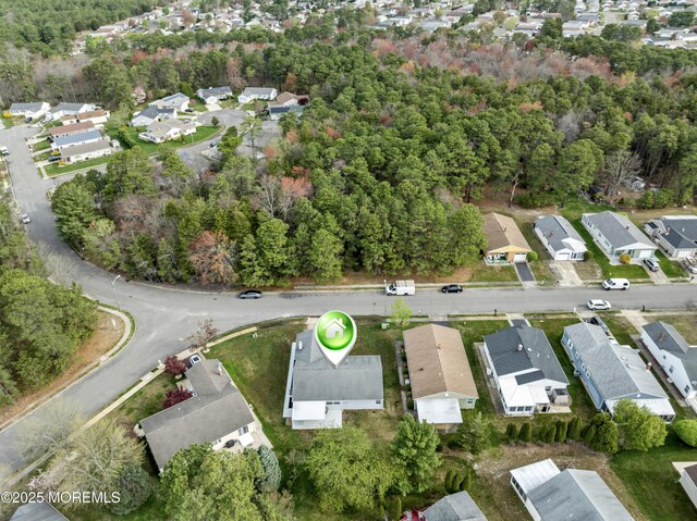aerial view with a residential view and a forest view