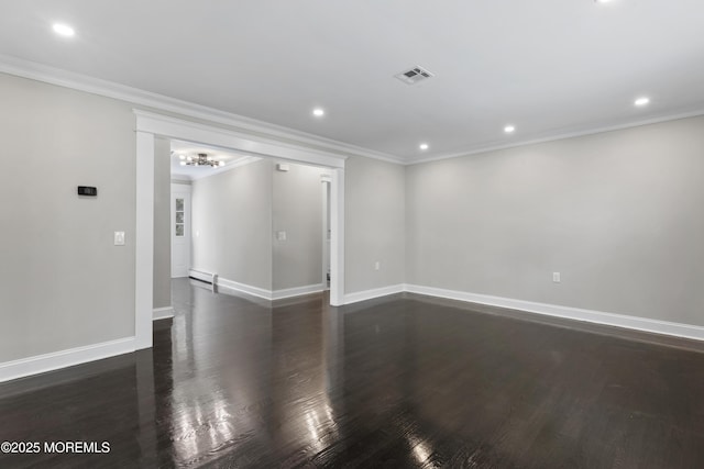 empty room featuring visible vents, ornamental molding, dark wood-style flooring, baseboards, and recessed lighting