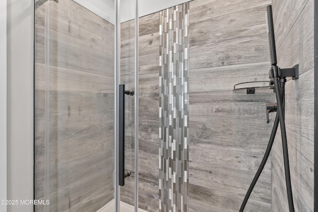 bathroom featuring a shower stall