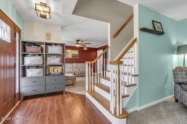 108 Longman St, Toms River, NJ 08753 - stairway with ceiling fan, wood finished floors, and baseboards