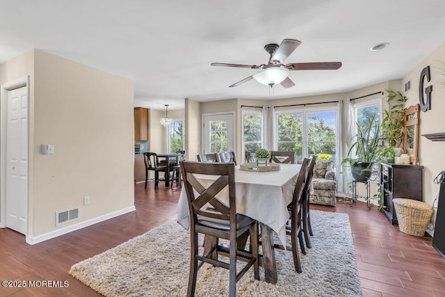 108 Longman St, Toms River, NJ 08753 - dining space featuring dark wood finished floors, visible vents, ceiling fan, and baseboards