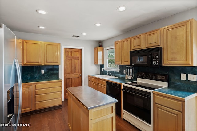 kitchen with visible vents, tasteful backsplash, a sink, black appliances, and light brown cabinets