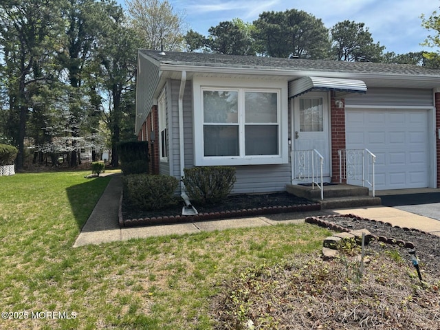 ranch-style home with concrete driveway, roof with shingles, an attached garage, brick siding, and a front lawn