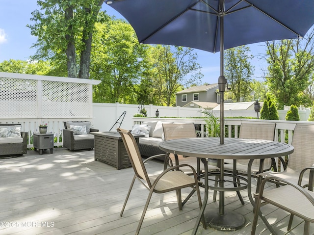 5 Blueberry Path, Howell, NJ 07731 - deck with an outdoor living space, a fenced backyard, and outdoor dining area