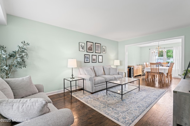 5 Blueberry Path, Howell, NJ 07731 - living room with a chandelier, dark wood finished floors, and baseboards