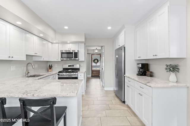 5 Blueberry Path, Howell, NJ 07731 - kitchen with appliances with stainless steel finishes, a sink, recessed lighting, a peninsula, and white cabinets