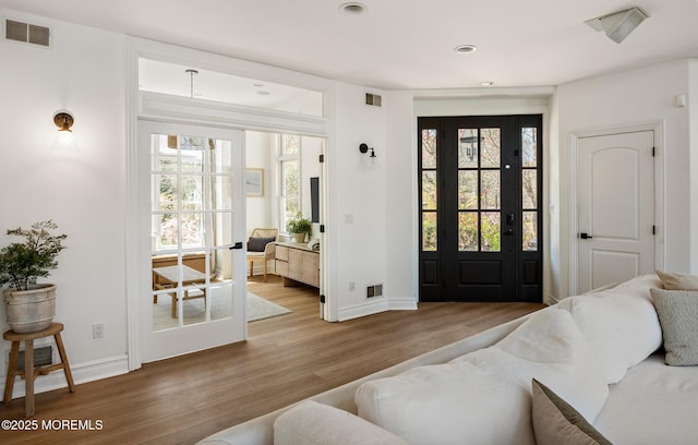 interior space with a wealth of natural light and visible vents