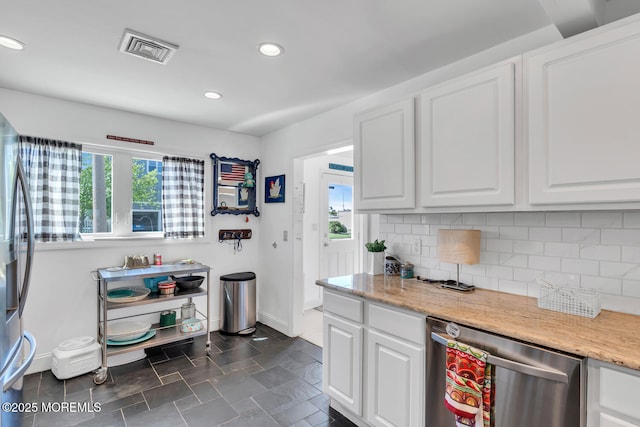 405 Sunset Dr S, Berkeley, NJ 08721 - kitchen featuring white cabinetry, stainless steel appliances, visible vents, and plenty of natural light