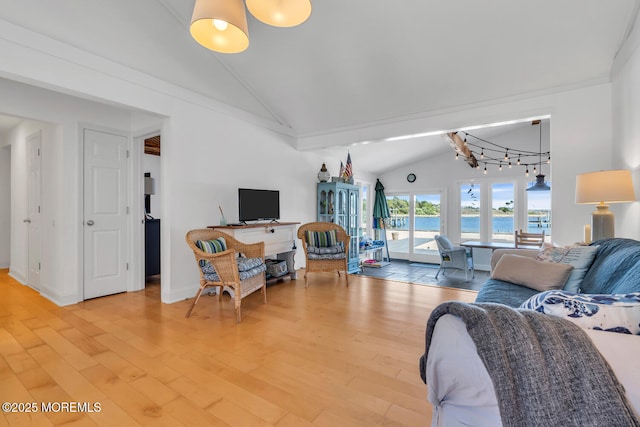 405 Sunset Dr S, Berkeley, NJ 08721 - living area with a notable chandelier, high vaulted ceiling, and wood finished floors