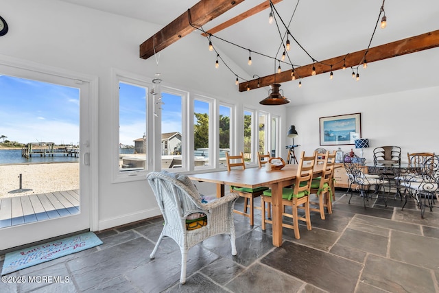 405 Sunset Dr S, Berkeley, NJ 08721 - dining area with stone tile floors, a water view, baseboards, and vaulted ceiling with beams